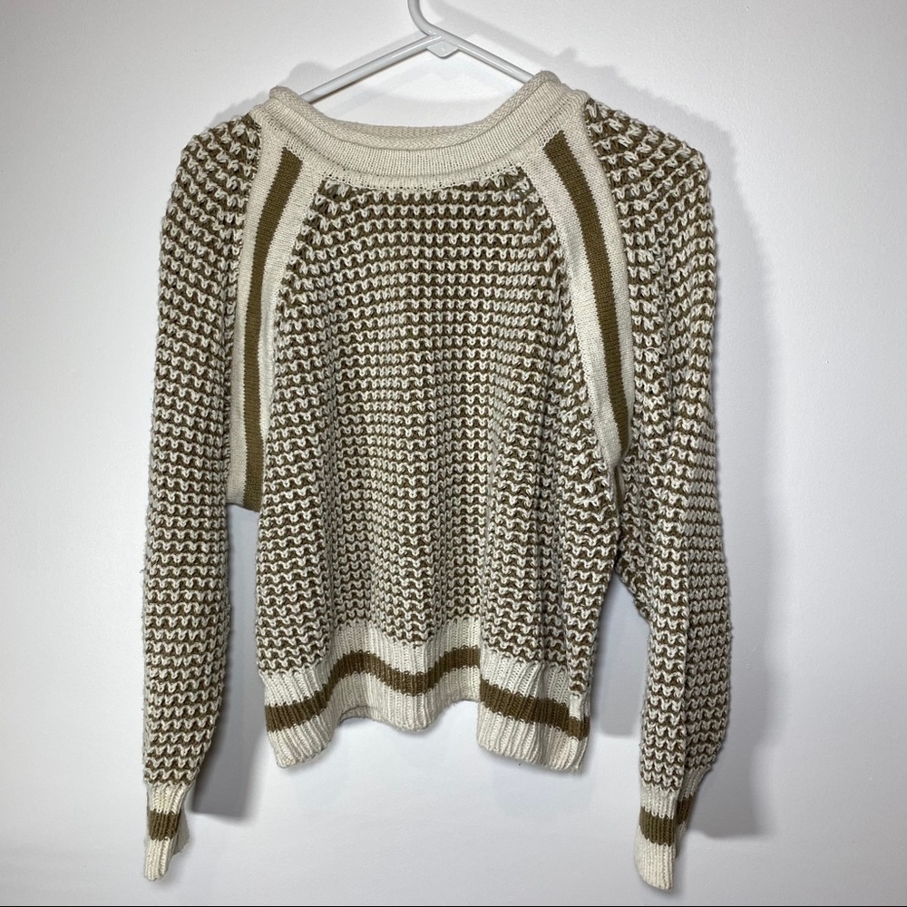 women’s knitted brown and white sweater
